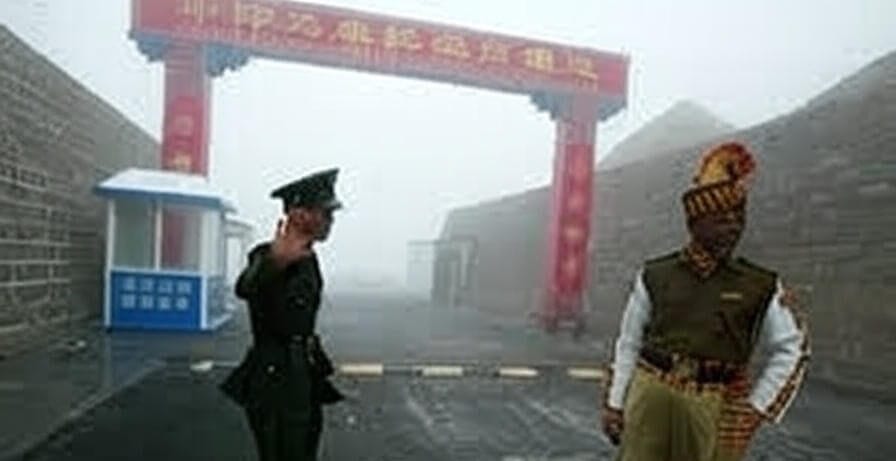 "A foggy scene at a border checkpoint with a red archway adorned with Chinese characters. A uniformed officer salutes on the left, standing near a small blue guard booth, while another individual in a colorful traditional outfit stands confidently on the right, with stone walls lining the pathway and a misty atmosphere creating a sense of mystery.